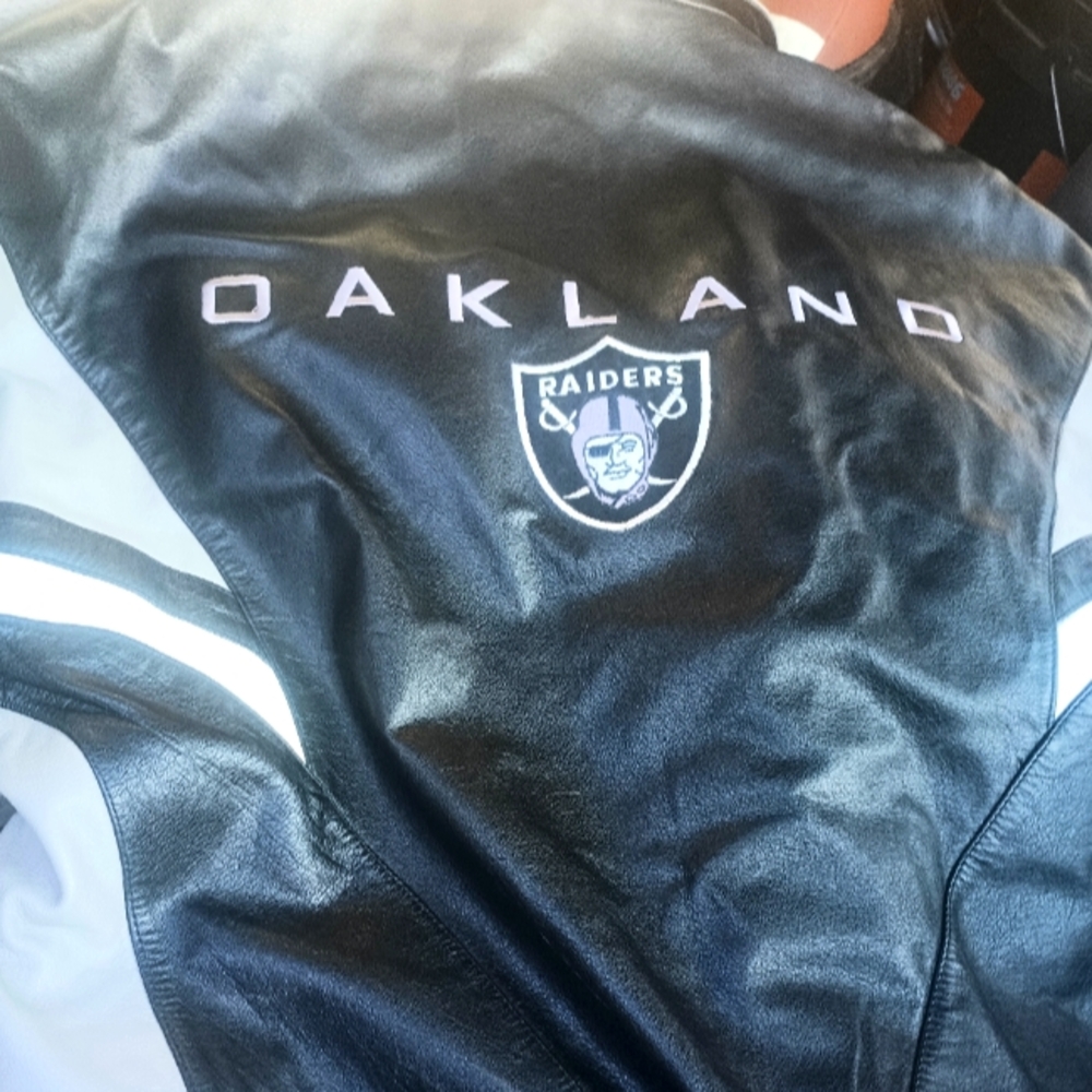 Brand new Oakland Raiders XLg leather coat